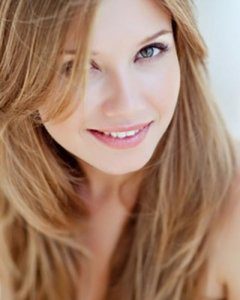 Beautiful woman's face with long blond hair