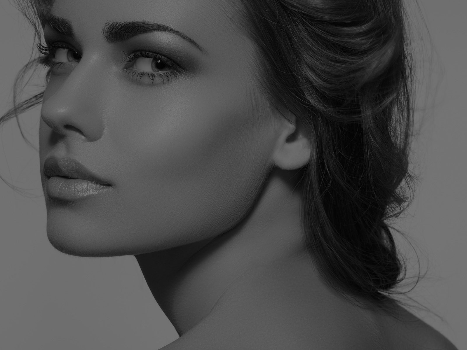 Beautiful female face shaped with botox and fillers